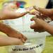 Elementary school children ply with goo during the 14th Annual Kids' Fair at University of Michigan on Friday. Melanie Maxwell I AnnArbor.com